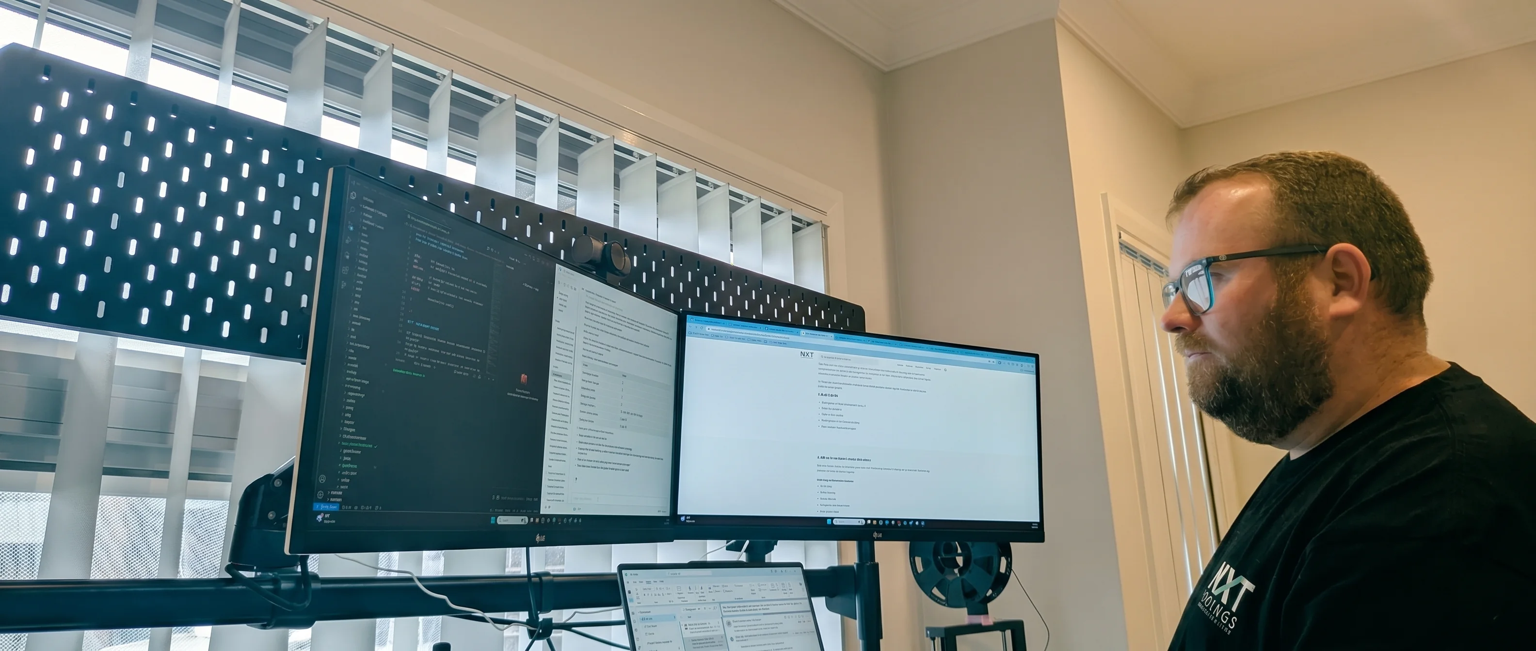 Heath McDonald, founder of NXT Innings Consulting, working at his desk